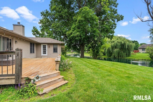 136 Lilac Ln, Chatham, IL 62629 - view of green lawn with a deck with water view