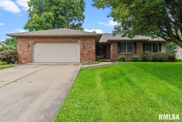 136 Lilac Ln, Chatham, IL 62629 - ranch-style house with an attached garage, brick siding, concrete driveway, and a front yard
