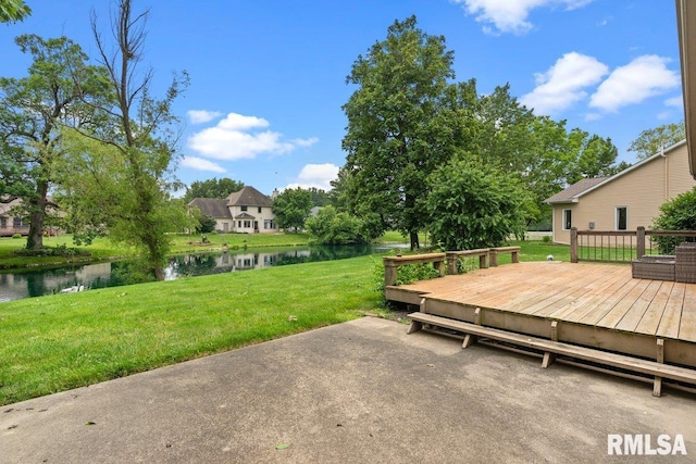 136 Lilac Ln, Chatham, IL 62629 - view of grassy yard with a deck with water view