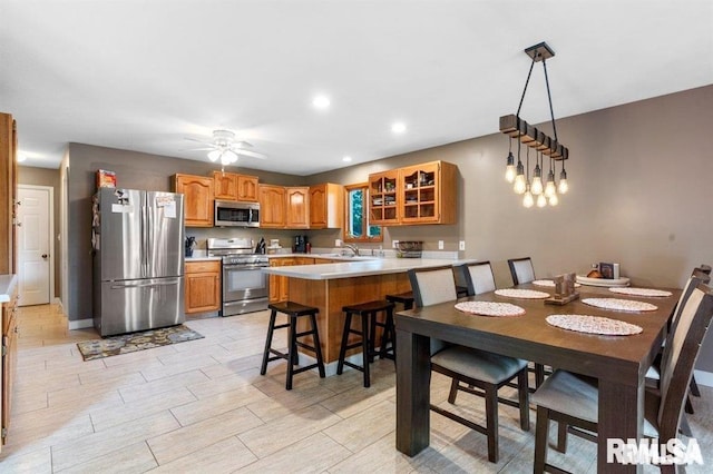136 Lilac Ln, Chatham, IL 62629 - dining area featuring ceiling fan, wood tiled floors, and recessed lighting
