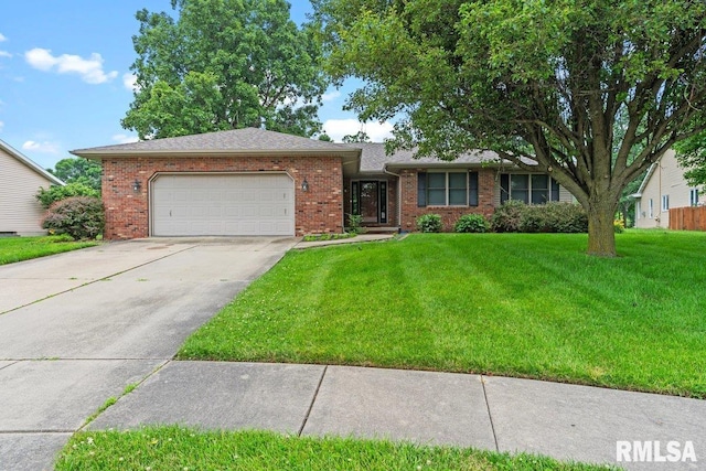 136 Lilac Ln, Chatham, IL 62629 - view of front of house featuring a garage, brick siding, driveway, and a front yard