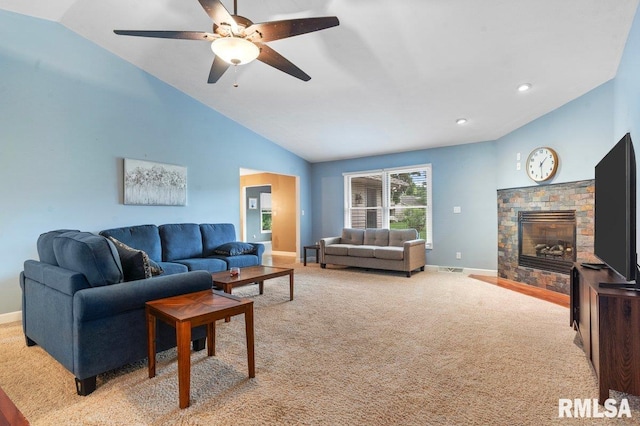 136 Lilac Ln, Chatham, IL 62629 - carpeted living room featuring lofted ceiling, baseboards, a fireplace with flush hearth, and ceiling fan
