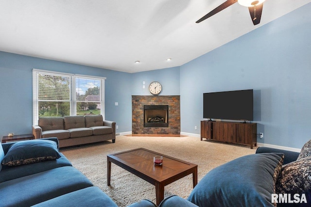 136 Lilac Ln, Chatham, IL 62629 - living area with carpet floors, baseboards, ceiling fan, and a fireplace with flush hearth
