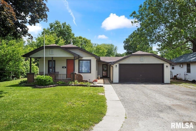 3024 Allis St, Springfield, IL 62703 - view of front of property featuring a garage, a front lawn, a porch, and driveway