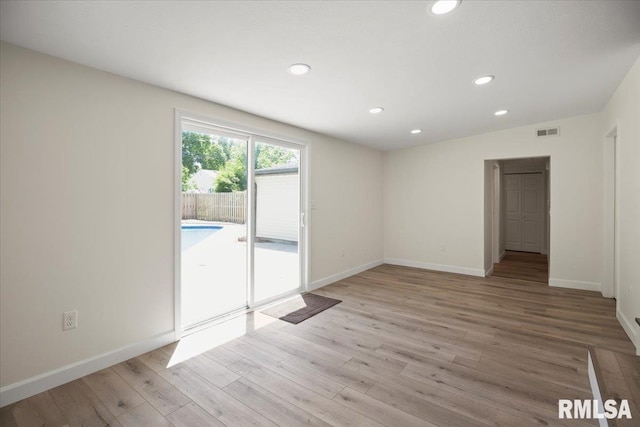 3024 Allis St, Springfield, IL 62703 - empty room with recessed lighting, light wood-type flooring, and baseboards