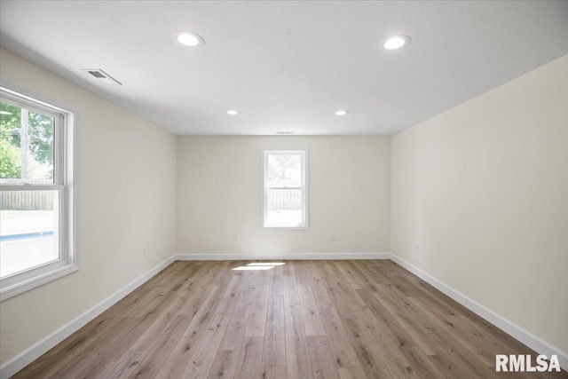 3024 Allis St, Springfield, IL 62703 - empty room with healthy amount of natural light, light wood-style floors, baseboards, and recessed lighting