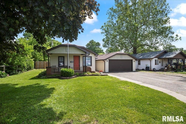 3024 Allis St, Springfield, IL 62703 - view of front facade featuring covered porch, a garage, and asphalt driveway