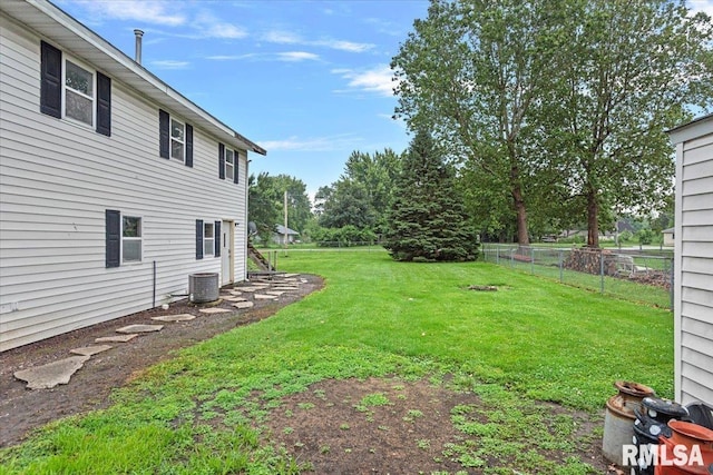 417 W Franklin St, Girard, IL 62640 - view of yard featuring central AC unit