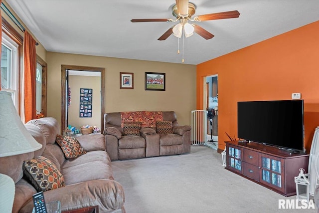 417 W Franklin St, Girard, IL 62640 - carpeted living area with a ceiling fan