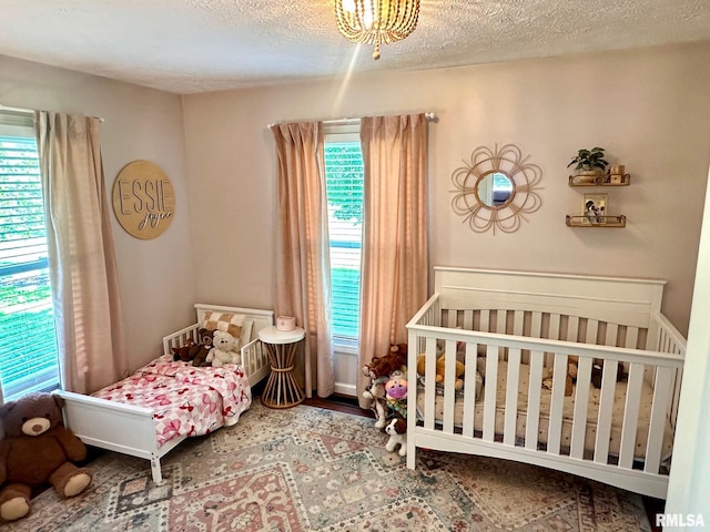 2900 Old State Rd, Alexander, IL 62601 - bedroom featuring a textured ceiling and wood finished floors