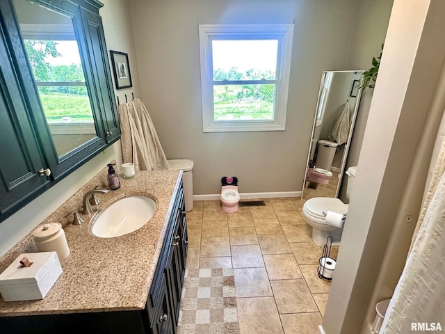 2900 Old State Rd, Alexander, IL 62601 - bathroom featuring vanity, toilet, baseboards, and tile patterned floors