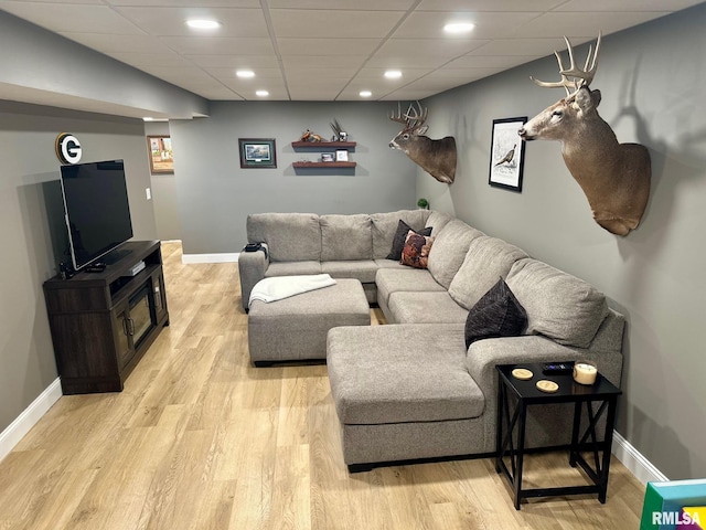2900 Old State Rd, Alexander, IL 62601 - living room with baseboards, light wood finished floors, recessed lighting, and a drop ceiling
