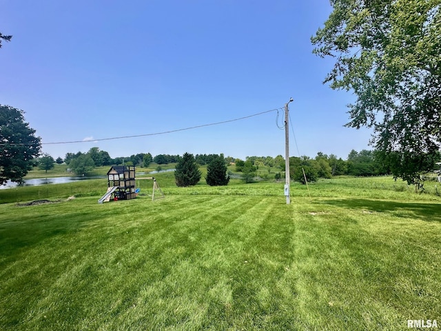 2900 Old State Rd, Alexander, IL 62601 - view of grassy yard with a water view and a playground