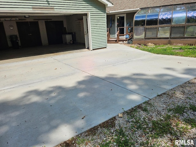 12862 Winnebago Dr, Plainview, IL 62685 - view of home's exterior with a garage and driveway