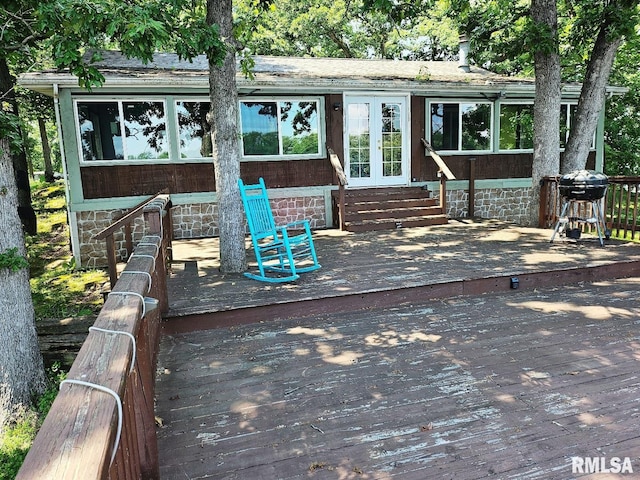 12862 Winnebago Dr, Plainview, IL 62685 - wooden deck with french doors, entry steps, and area for grilling