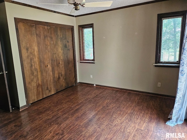 12862 Winnebago Dr, Plainview, IL 62685 - unfurnished bedroom with wood finished floors, ornamental molding, a textured ceiling, baseboards, and ceiling fan
