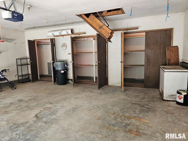 12862 Winnebago Dr, Plainview, IL 62685 - garage featuring a garage door opener