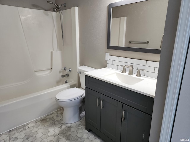 208 Elm St, Dawson, IL 62520 - full bathroom with vanity, toilet, bathtub / shower combination, and decorative backsplash