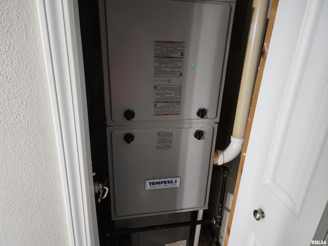 208 Elm St, Dawson, IL 62520 - utility room featuring heating unit