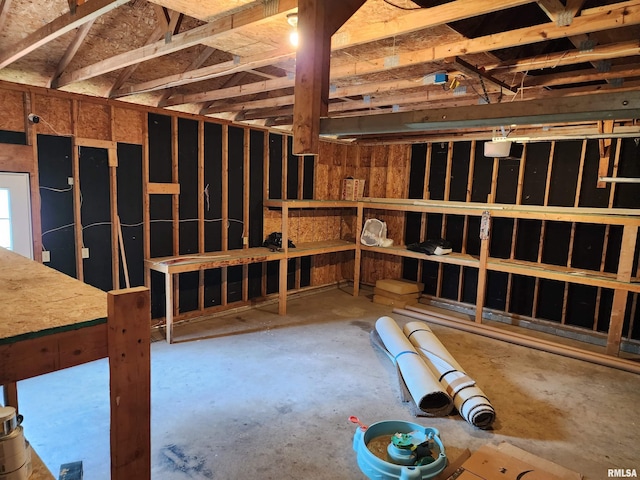 208 Elm St, Dawson, IL 62520 - miscellaneous room with concrete floors