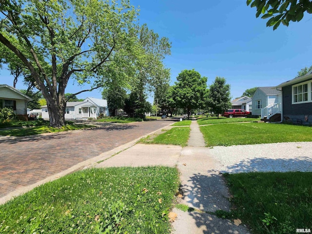 2240 Holmes Ave, Springfield, IL 62704 - view of decorative road featuring a residential view and sidewalks