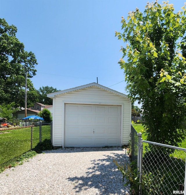 2240 Holmes Ave, Springfield, IL 62704 - detached garage with gravel driveway