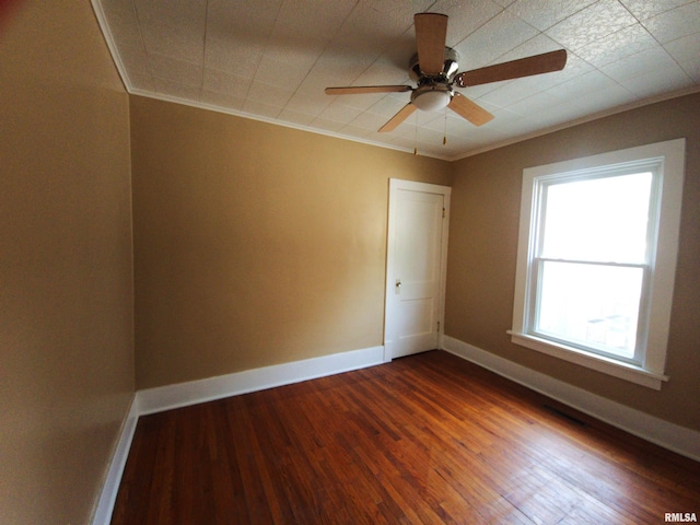 2240 Holmes Ave, Springfield, IL 62704 - unfurnished room featuring plenty of natural light, ornamental molding, wood finished floors, and ceiling fan