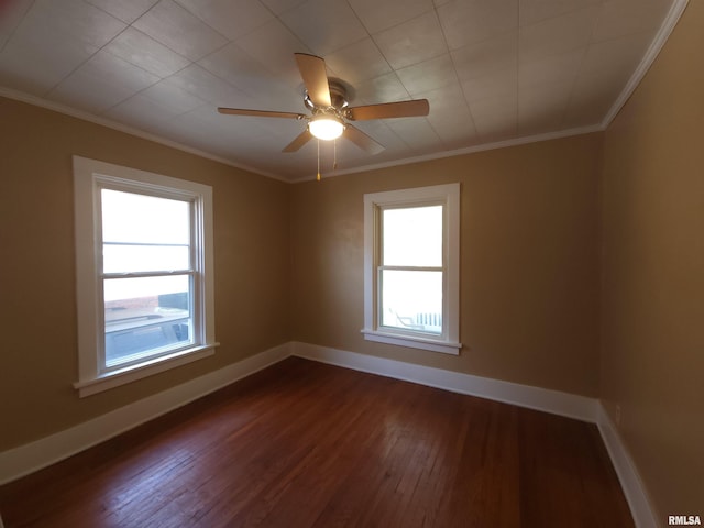 2240 Holmes Ave, Springfield, IL 62704 - spare room featuring dark wood-style flooring, ceiling fan, and ornamental molding