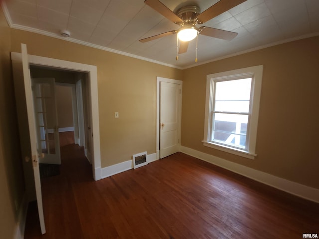 2240 Holmes Ave, Springfield, IL 62704 - unfurnished bedroom featuring dark wood-type flooring, ornamental molding, ceiling fan, and a closet