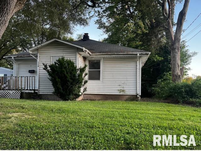 3208 E Elm St, Springfield, IL 62702 - back of property featuring a yard and a chimney