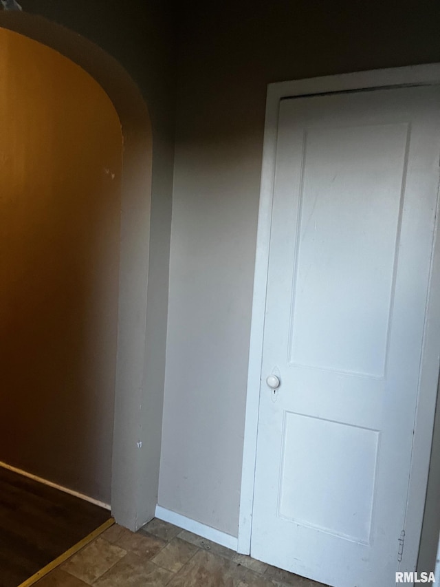 3208 E Elm St, Springfield, IL 62702 - unfurnished bedroom with arched walkways and baseboards