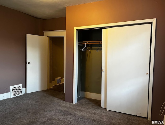 3208 E Elm St, Springfield, IL 62702 - unfurnished bedroom featuring carpet and a closet