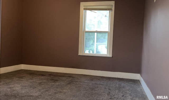 3208 E Elm St, Springfield, IL 62702 - carpeted empty room featuring baseboards