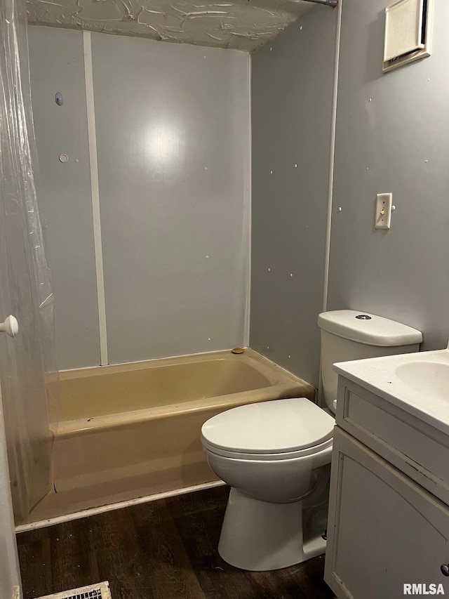3208 E Elm St, Springfield, IL 62702 - bathroom featuring wood finished floors, vanity, and bathtub / shower combination