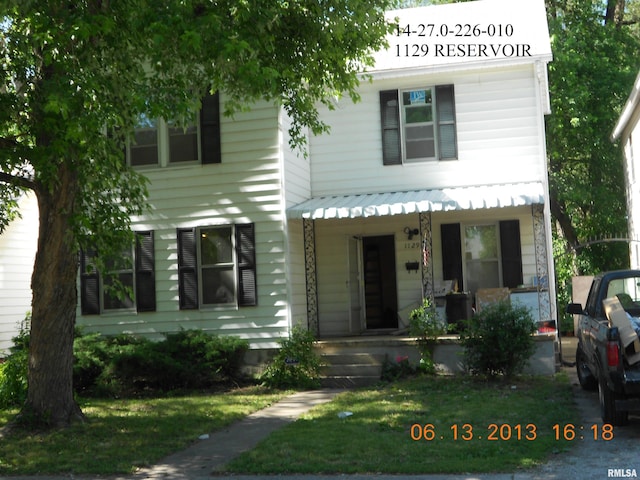 1129 E Reservoir St, Springfield, IL 62702 - view of front of house featuring a porch
