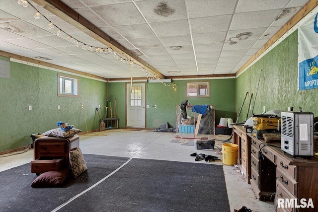 14455 E Dutch Henry Rd, Lewistown, IL 61542 - miscellaneous room with a paneled ceiling, concrete floors, and plenty of natural light