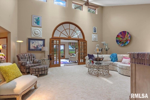 9 Windfall Ln, Cantrall, IL 62625 - living room featuring a towering ceiling, carpet flooring, and french doors