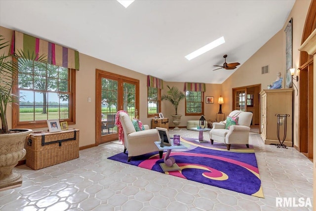 9 Windfall Ln, Cantrall, IL 62625 - living room featuring a skylight and high vaulted ceiling