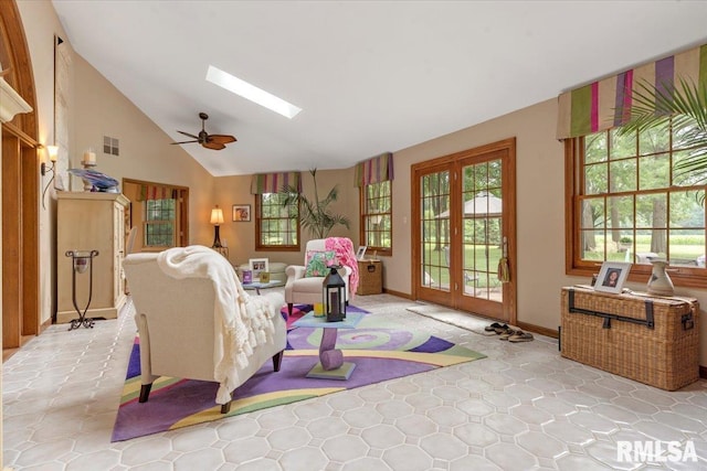 9 Windfall Ln, Cantrall, IL 62625 - living room with a skylight, a ceiling fan, french doors, and high vaulted ceiling