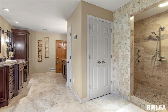 9 Windfall Ln, Cantrall, IL 62625 - bathroom with a closet, a walk in shower, vanity, and recessed lighting