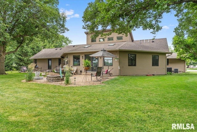 9 Windfall Ln, Cantrall, IL 62625 - back of property with a patio and a lawn