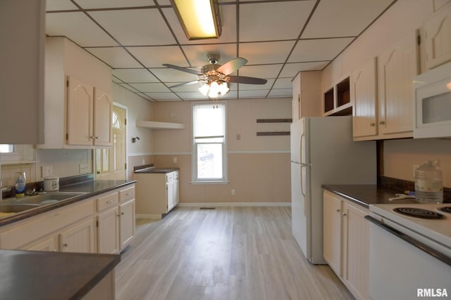 931 W Vandeveer St, Taylorville, IL 62568 - kitchen with open shelves, white appliances, a ceiling fan, dark countertops, and light wood-style floors