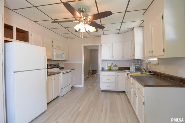 931 W Vandeveer St, Taylorville, IL 62568 - kitchen with white appliances, dark countertops, a paneled ceiling, ceiling fan, and white cabinets