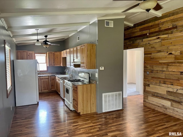1164 Arcadia Dr, Galesburg, IL 61401 - kitchen featuring white appliances, ceiling fan, wooden walls, dark wood-type flooring, and dark countertops