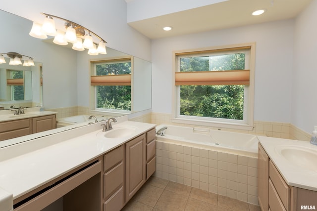6718 Shadow Ln, Quincy, IL 62305 - bathroom featuring two vanities, plenty of natural light, tile patterned flooring, and recessed lighting