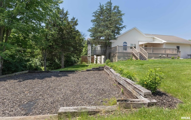 6718 Shadow Ln, Quincy, IL 62305 - view of green lawn with a deck and stairway