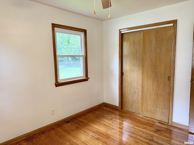 465 Fifer St, Galesburg, IL 61401 - unfurnished bedroom with light wood-style flooring and a closet