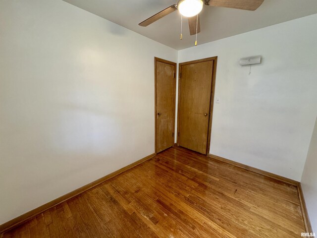 465 Fifer St, Galesburg, IL 61401 - empty room featuring wood finished floors and a ceiling fan