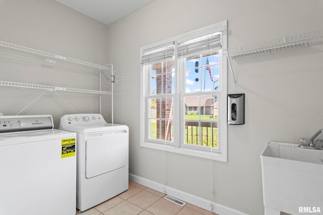 230 Possum Pass Ct, Sherman, IL 62684 - washroom featuring washer and dryer and light tile patterned floors
