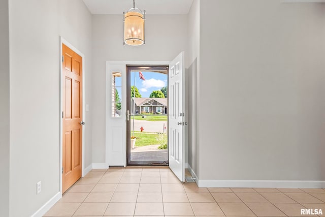 230 Possum Pass Ct, Sherman, IL 62684 - entrance foyer featuring light tile patterned flooring and a chandelier